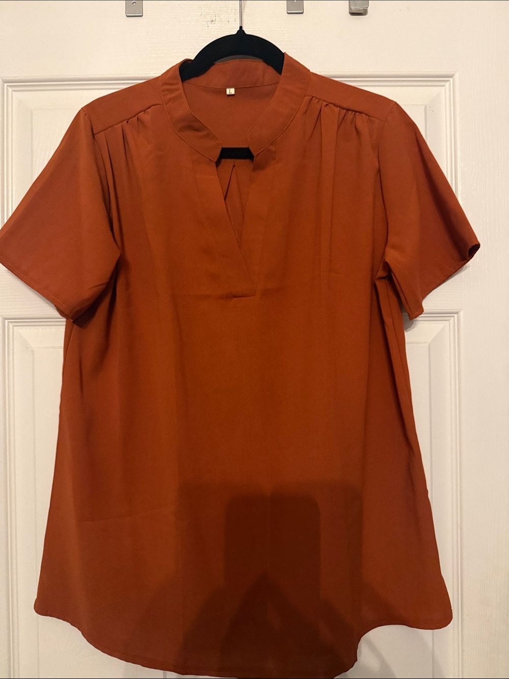 Women’s Short-Sleeve V-Neck. Shirt in Rust